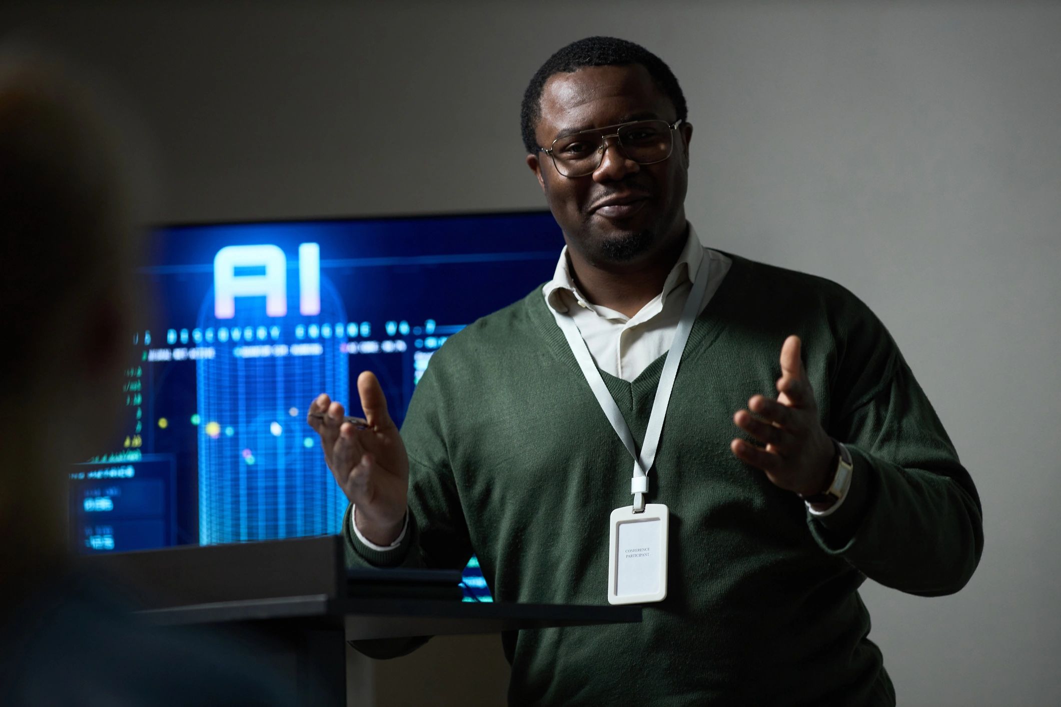Presenter discussing AI strategy in a business meeting
